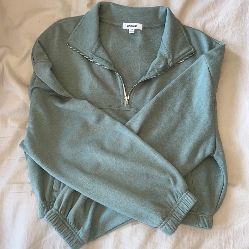 cropped garage quarter zip